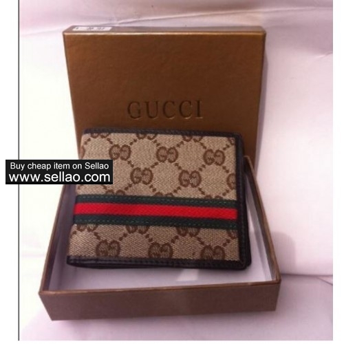 GUCCI Embossed Leather. Wallet